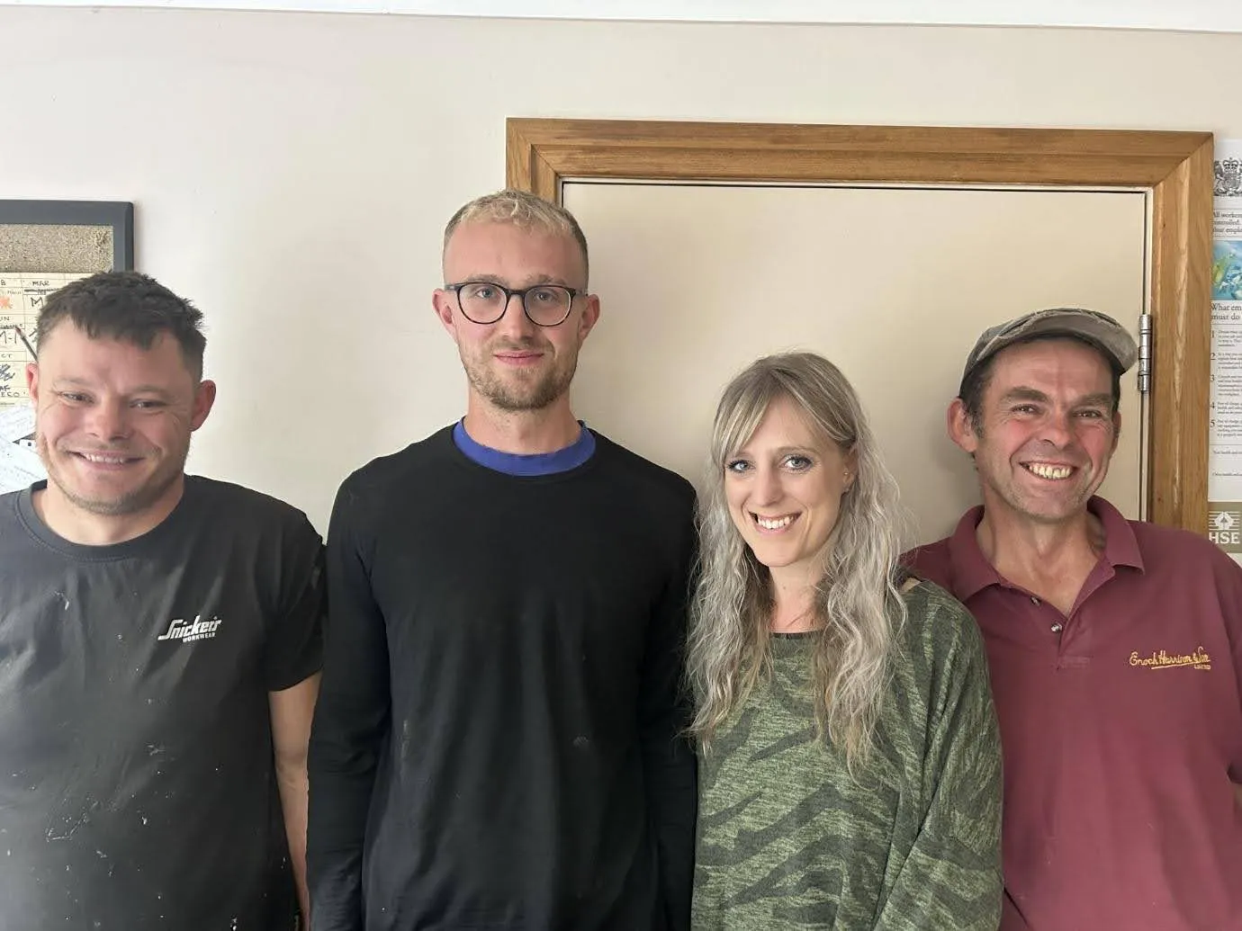A group of people standing next to each other.